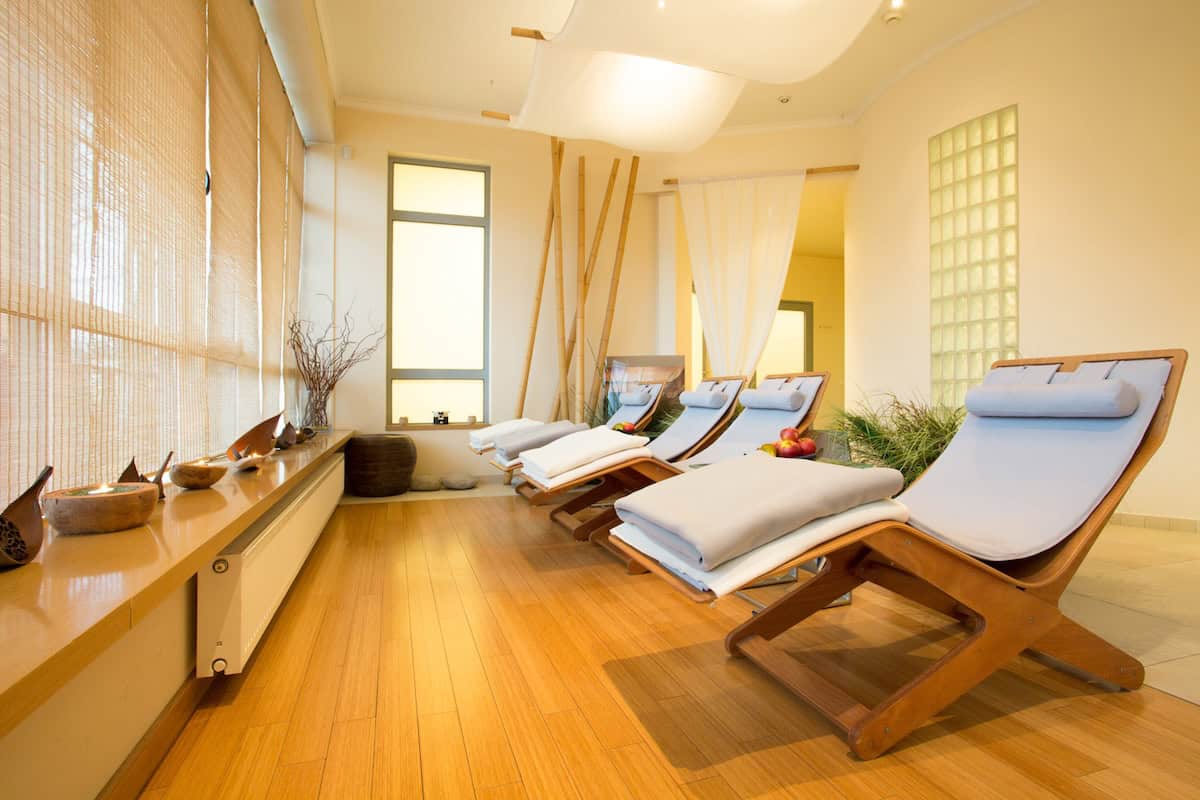 Interior of a wellness center designed for relaxation, with warm lighting and comfortable furniture